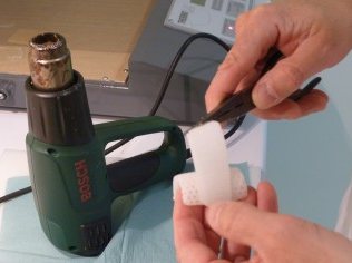 Chauffage de la plaque de silicone au pistolet à air chaud